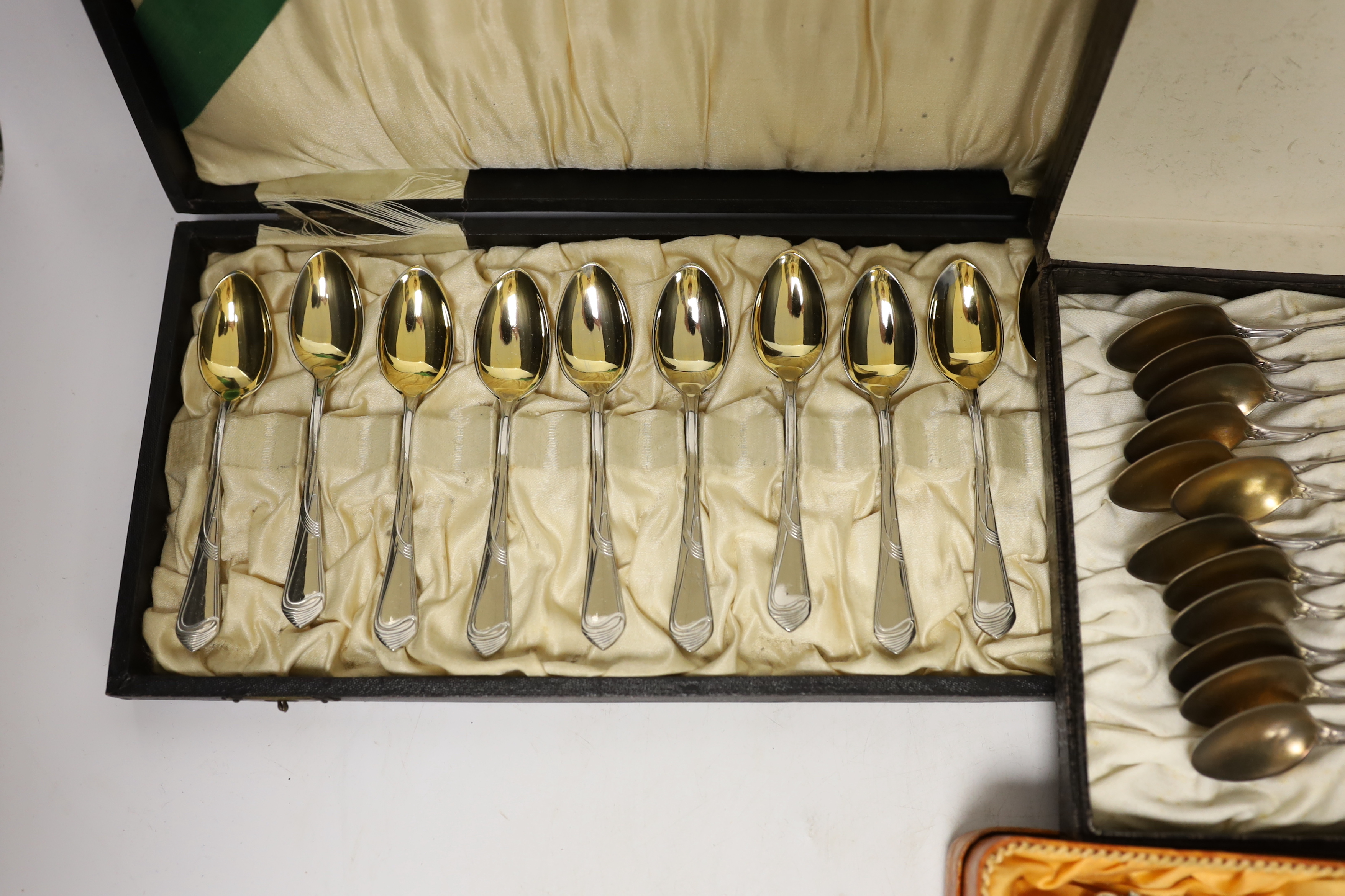 Four cased Continental cutlery sets, one 800 standard